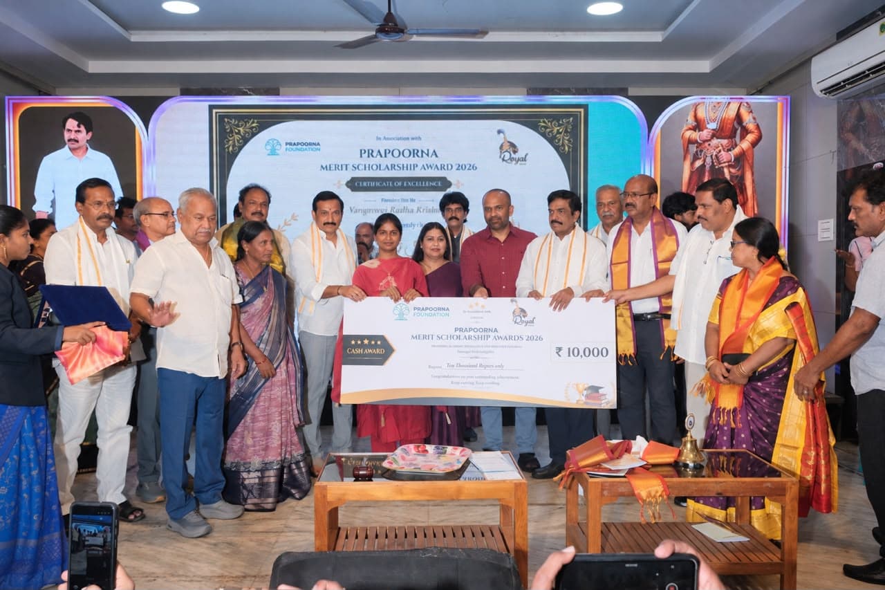 A student, Pushpa Valli and guests presenting a Prapoorna Foundation merit scholarship cash award in 2026.
